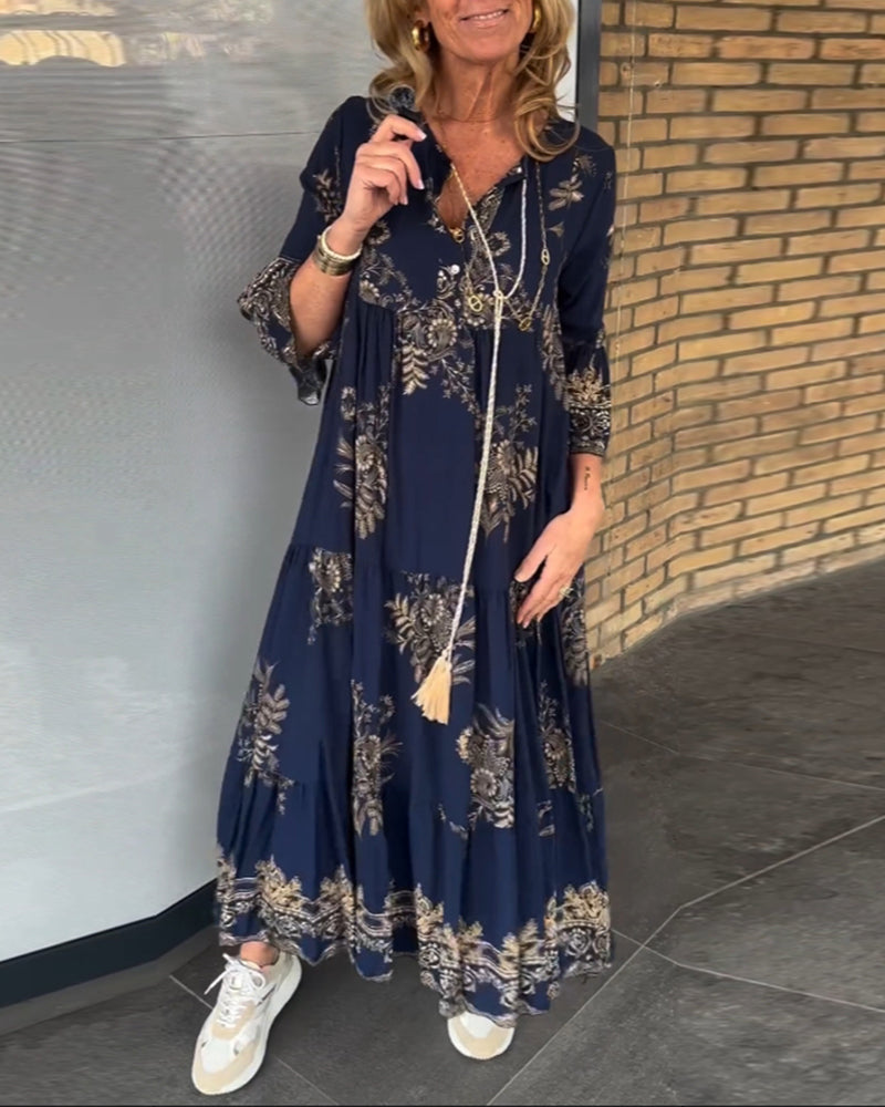 Damska sukienka midi z nadrukiem i dekoltem w kształcie litery V