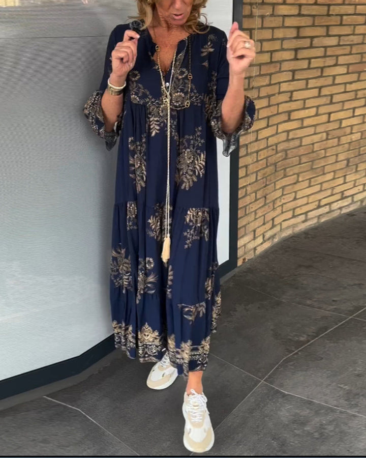 Damska sukienka midi z nadrukiem i dekoltem w kształcie litery V