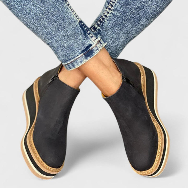 Stivaletti con plateau impermeabili da donna dotati di cerniera laterale di facile accesso