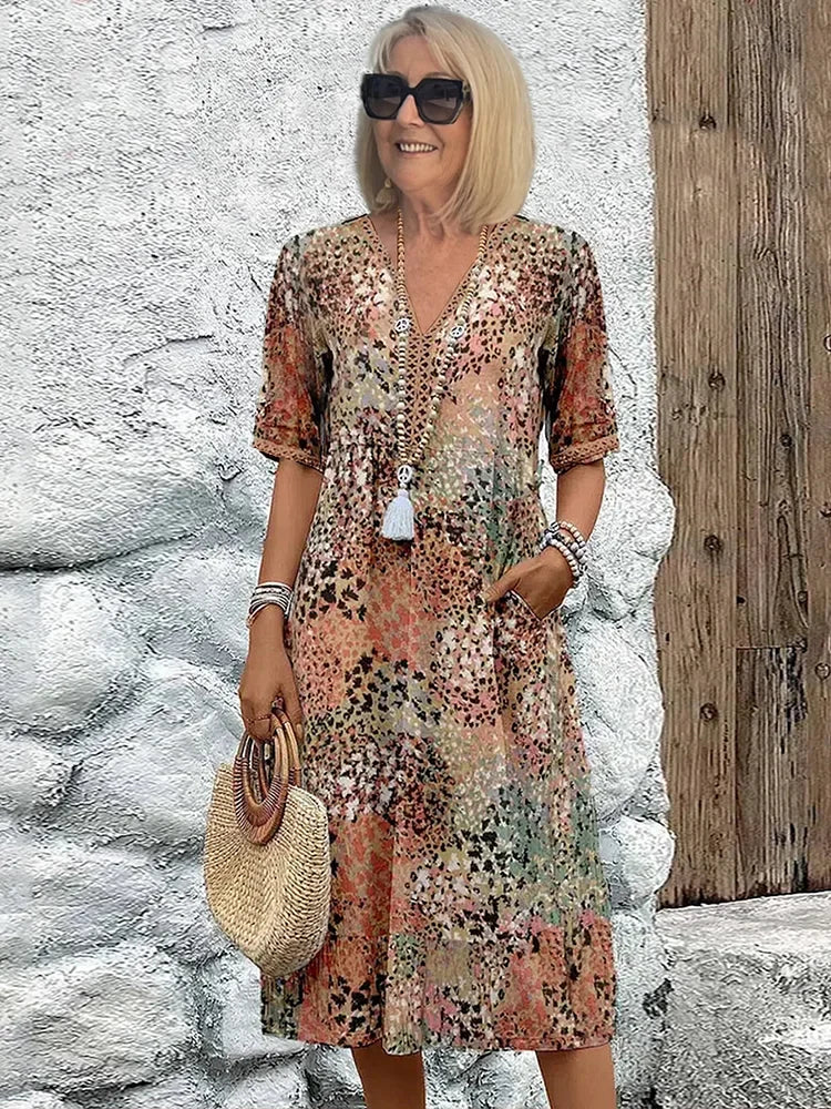 Elegant Dress Women with Vibrant Print & Flowing Silhouette SandStone Boutique Elegant Dress Women with Vibrant Print & Flowing Silhouette SandStone Boutique