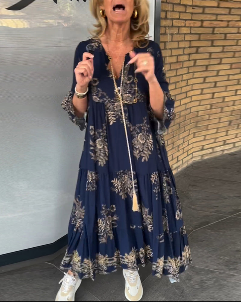 Damska sukienka midi z nadrukiem i dekoltem w kształcie litery V