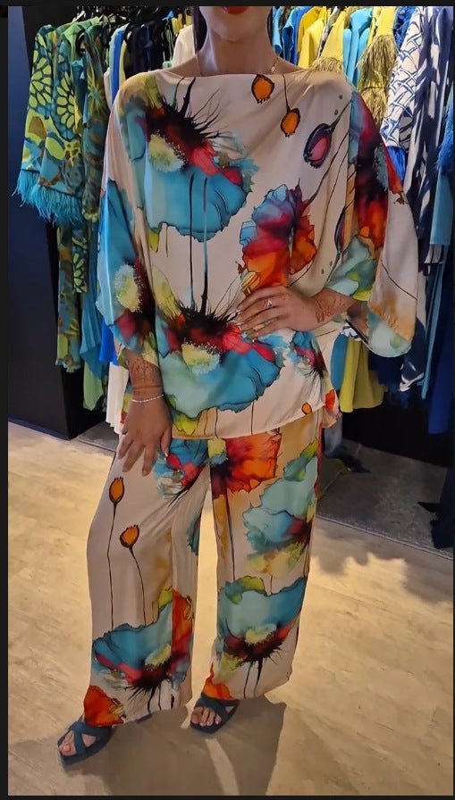 Kirkas ja rohkea naisten kaksoissetti, ylellinen kangas, kirkas printti, joustava istuvuus, mukava