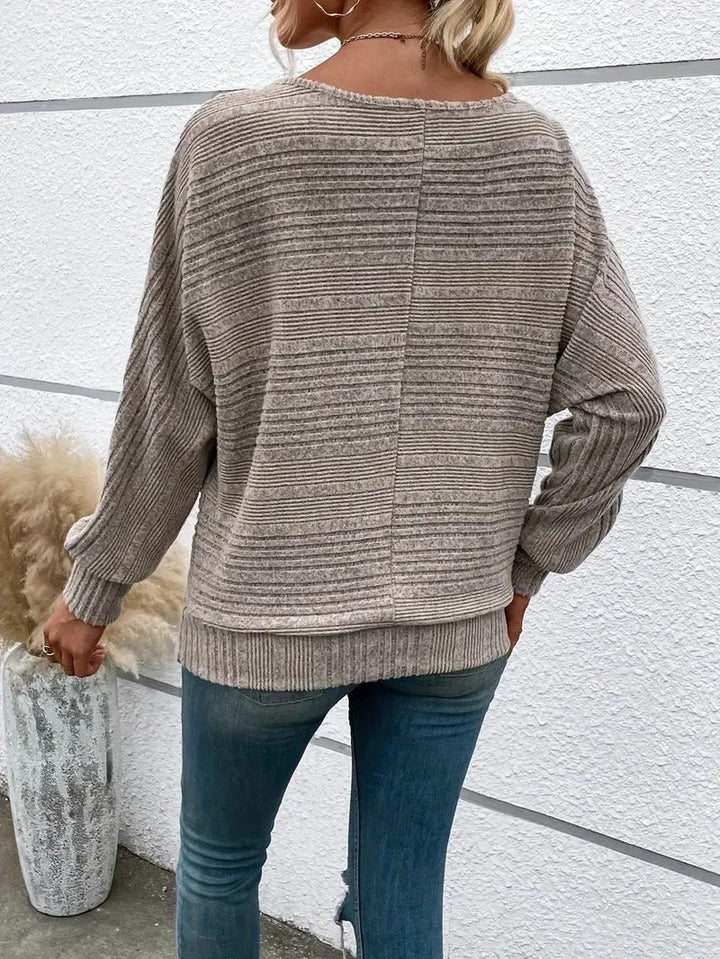 Pull en maille douce à manches chauve-souris pour femme